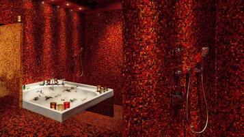 Un baño con una bañera grande, ducha y pared con azulejos.