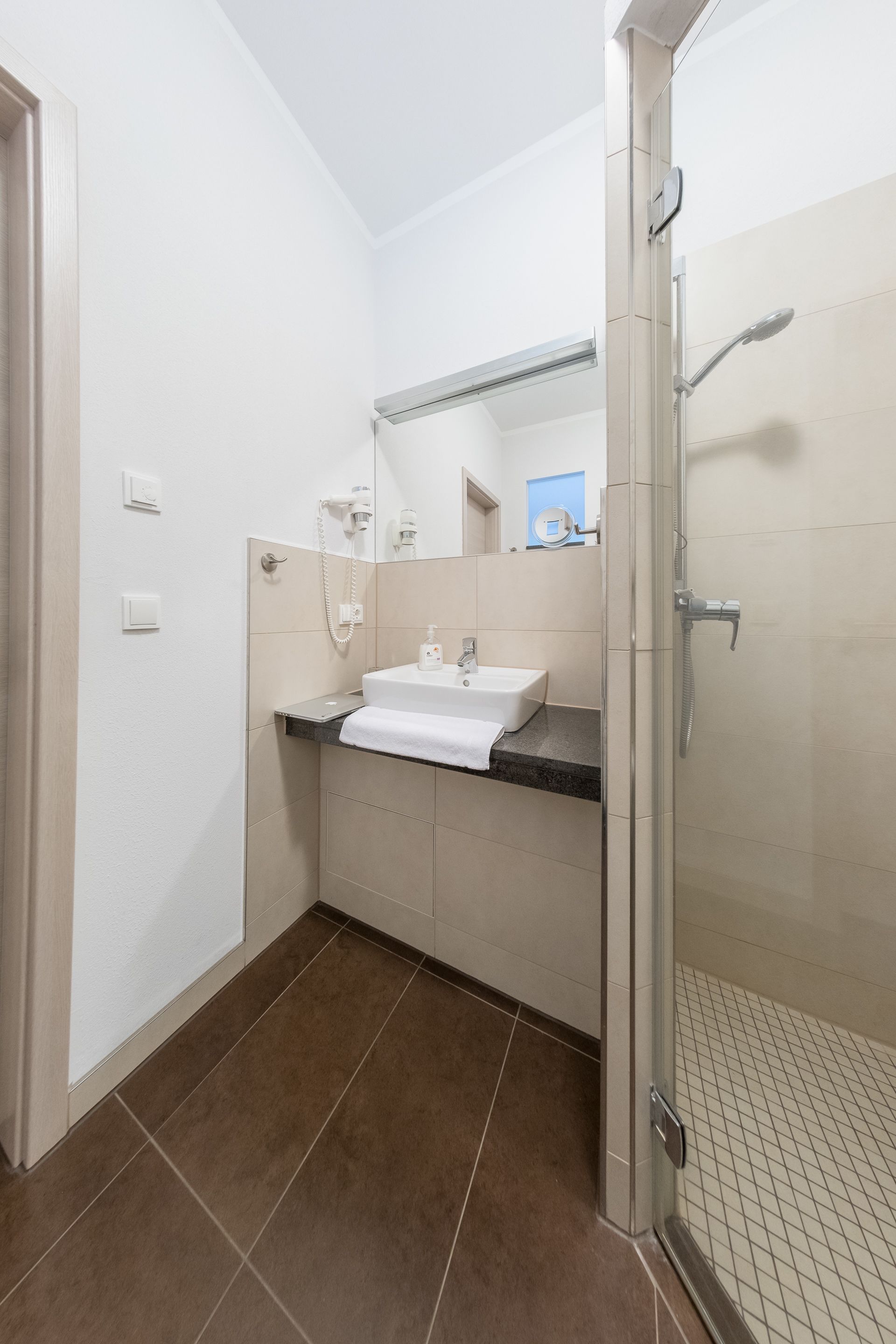 shower, free toiletries, hair dryer, towels