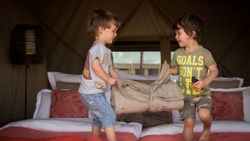 Desk, blackout drapes, bed sheets