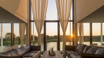 Deluxe Terrace Double Suites | Living area | Flat-screen TV