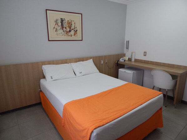 Double Room | Minibar, in-room safe, desk, iron/ironing board