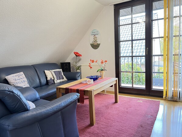 Appartement exclusif, salle de bain privée (Borkum) | Aire de séjour | Téléviseur connecté, Netflix, lecteur de DVD, films en primeur