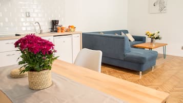 Apartment, 1 Bedroom | Living area | Flat-screen TV