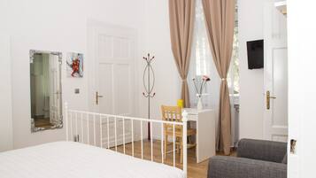 Deluxe Studio | Premium bedding, pillow-top beds, individually decorated