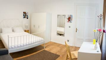 Deluxe Studio | Premium bedding, pillow-top beds, individually decorated
