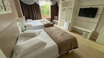 Luxury Quadruple Room, 1 Bedroom, Private Bathroom | Blackout drapes, free WiFi, wheelchair access