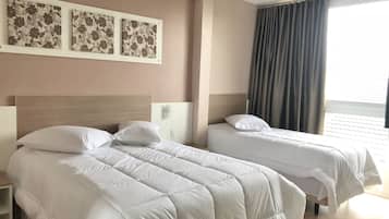 Quarto triplo superluxo, 1 quarto, banheiro privativo | Cortinas blackout, Wi-Fi de cortesia, acesso para cadeiras de rodas