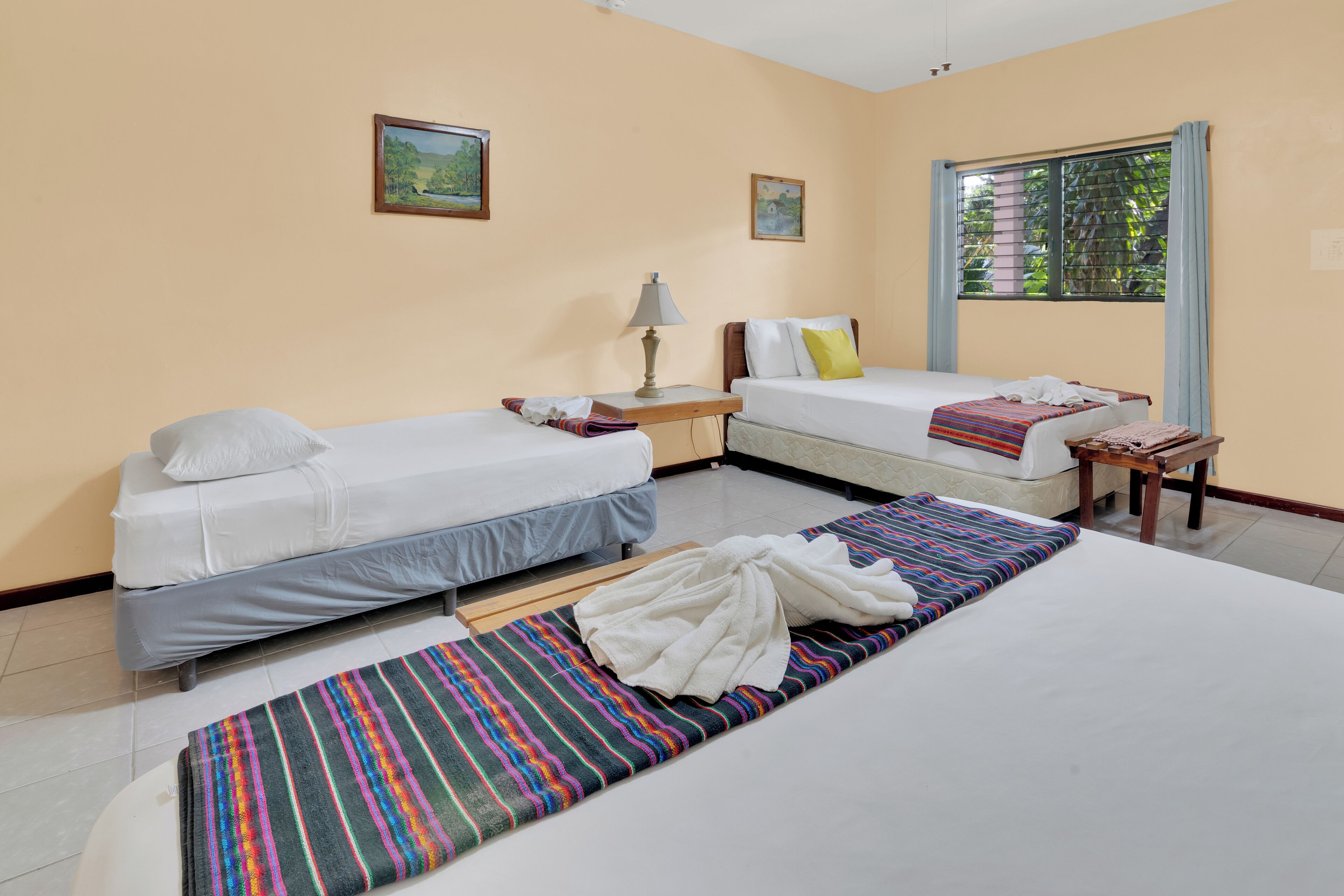 family room, multiple beds | iron/ironing board, free wifi, bed sheets