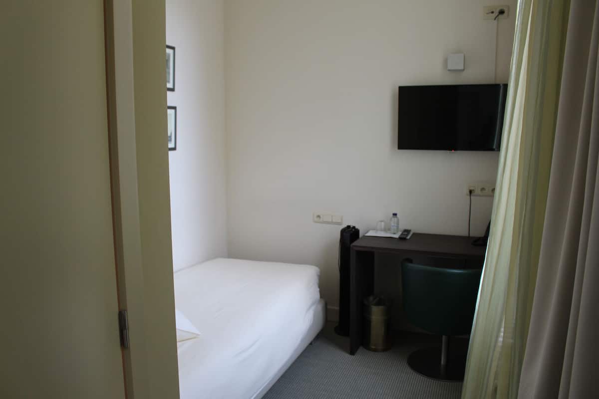 Desk, blackout curtains, soundproofing, iron/ironing board