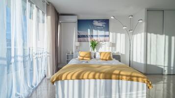 Apartment, 2 Bedrooms, Sea View | In-room safe, iron/ironing board, free WiFi, bed sheets
