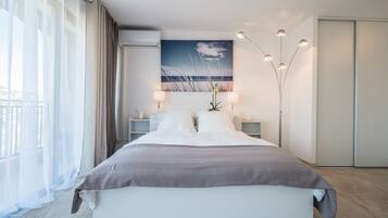 Appartement, 1 chambre | Coffres-forts dans les chambres, fer et planche à repasser