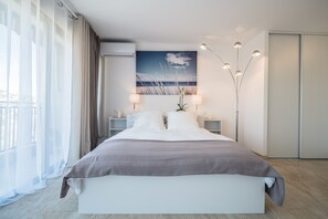 Apartment, 1 Bedroom | In-room safe, iron/ironing board, free WiFi, bed sheets