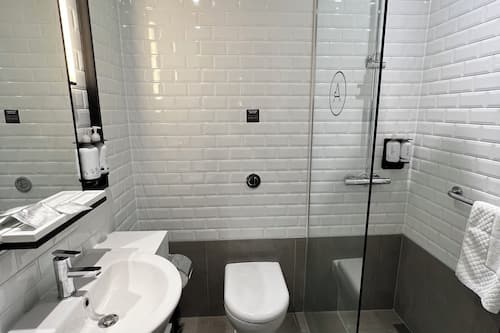 Shower, free toiletries, hair dryer, towels