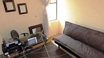 Apartment, 3 Bedrooms | Living area | Flat-screen TV, DVD player