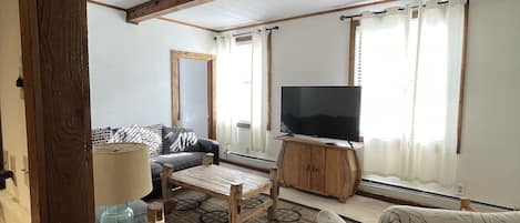 Family Apartment, 1 Bedroom, Kitchen | Living area | TV