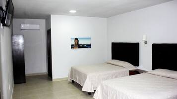 Economy Twin Room | Desk, iron/ironing board, free WiFi, bed sheets