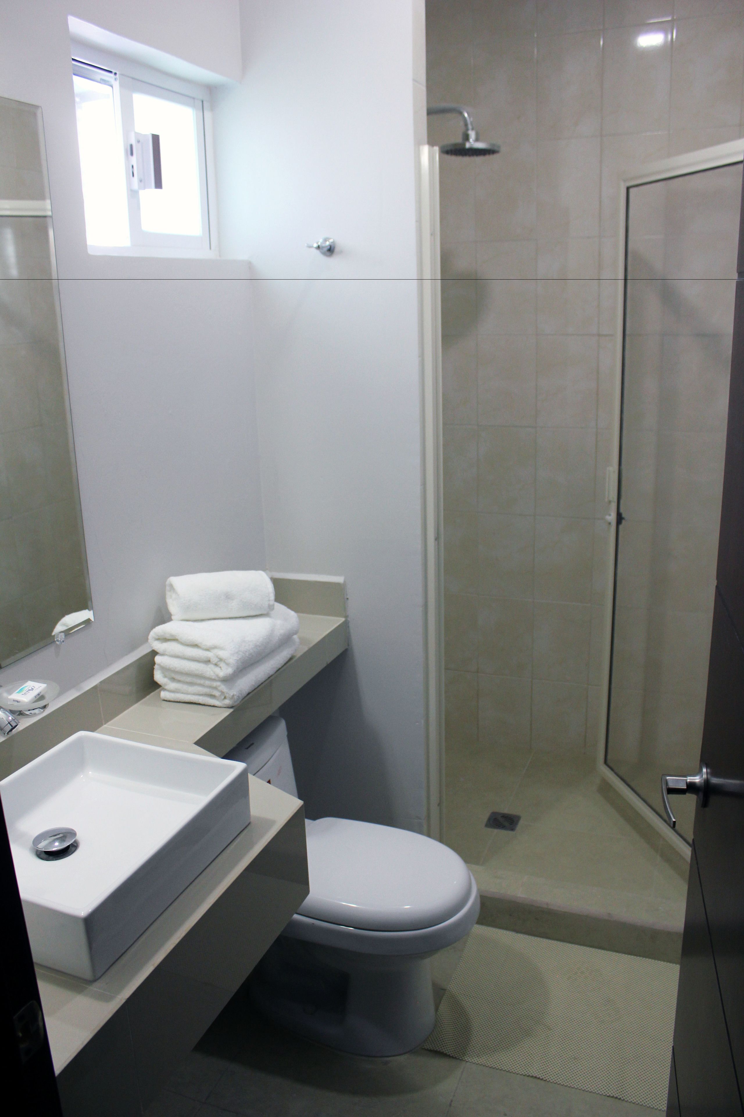 economy twin room | bathroom | shower, free toiletries, towels