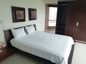 Departamento, 2 habitaciones, vista al océano | 1 habitación, wifi gratis y ropa de cama 