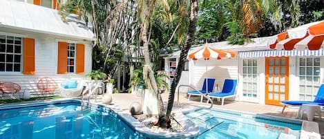 Outdoor pool, pool umbrellas, sun loungers