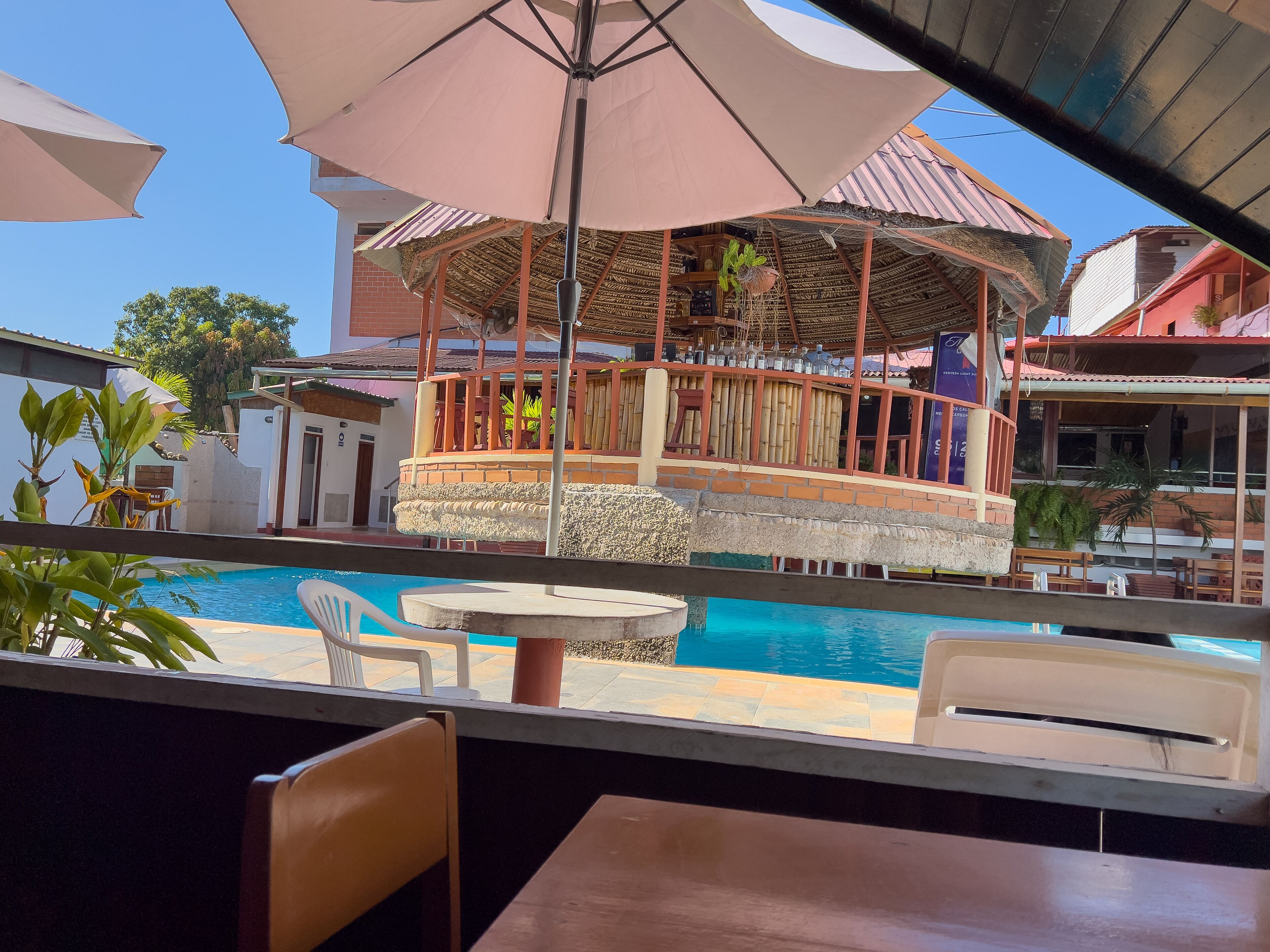 outdoor pool, pool umbrellas, pool loungers