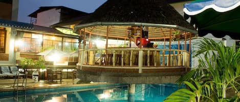 Outdoor pool, pool umbrellas, pool loungers