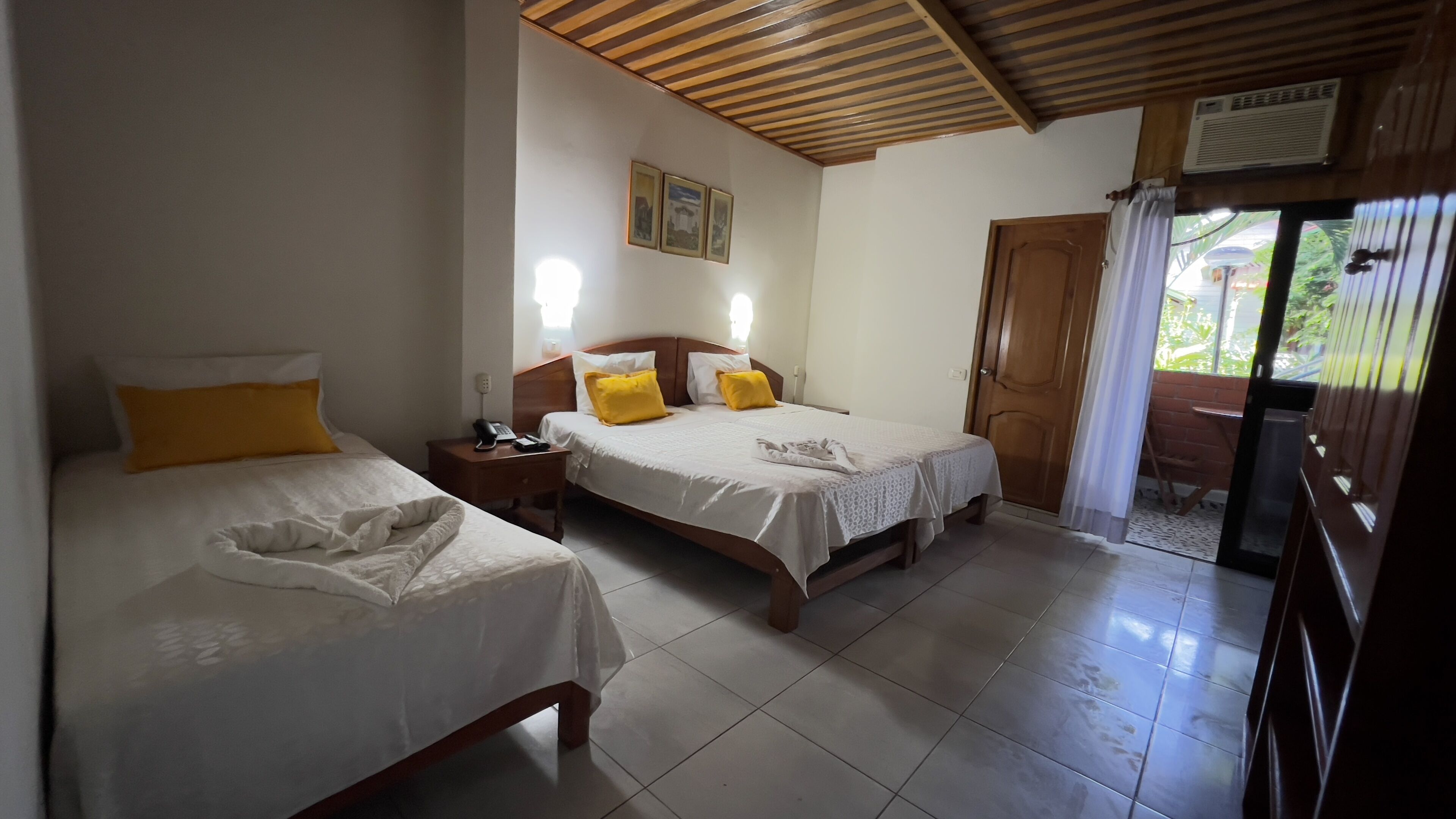 triple room, multiple beds | minibar, in-room safe, desk, soundproofing