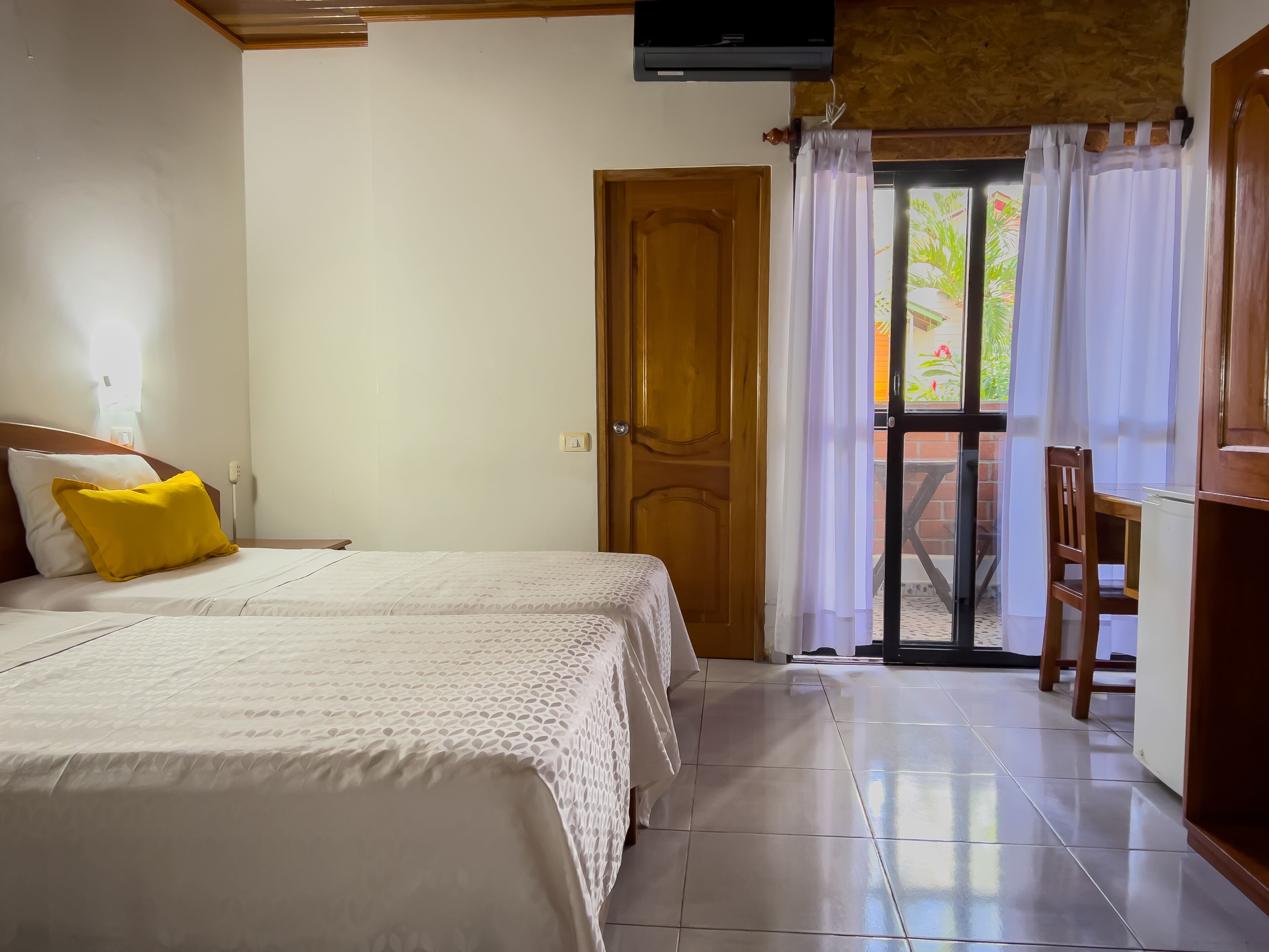 triple room, multiple beds | minibar, in-room safe, desk, soundproofing