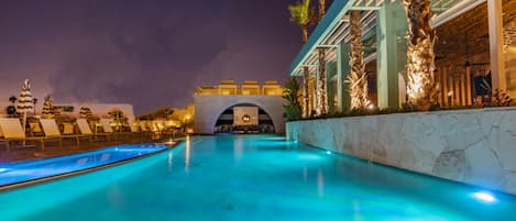 Outdoor pool, pool umbrellas, sun loungers