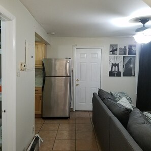 Signature Condo, 1 Bedroom, Kitchen, Courtyard View | Living area