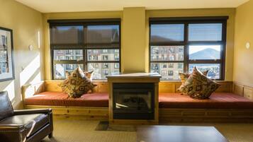 Condo, 1 Bedroom | Living room | Flat-screen TV, fireplace