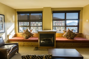 Condo, 1 Bedroom | Living room | Flat-screen TV, fireplace