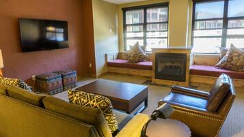 Condo, 1 Bedroom | Living room | Flat-screen TV, fireplace