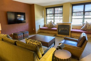Condo, 1 Bedroom | Living room | Flat-screen TV, fireplace