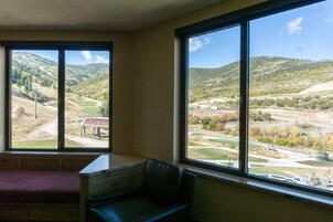 Condo, 1 Bedroom | Living room | Flat-screen TV, fireplace