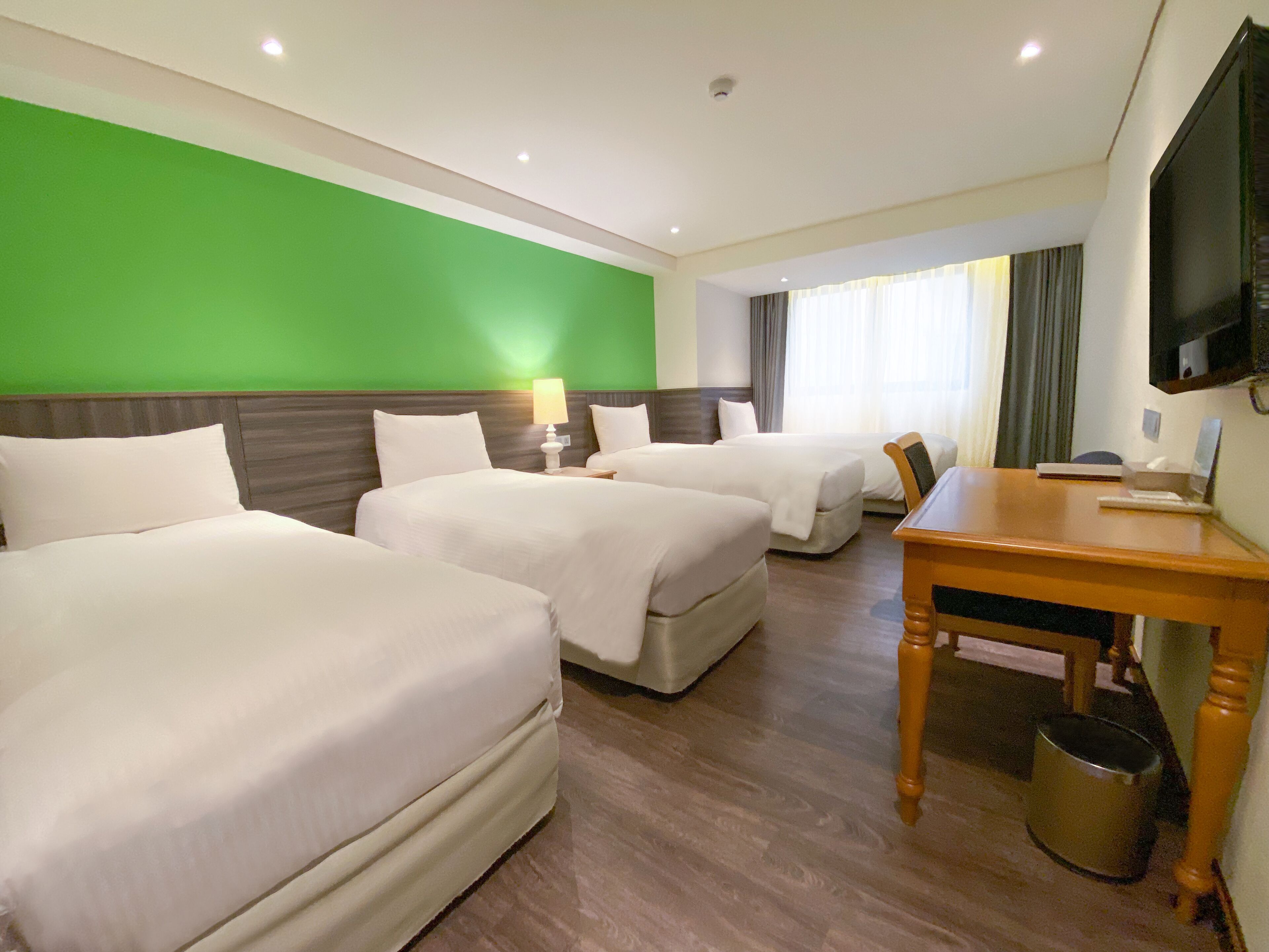 deluxe quadruple room, 4 single beds | view from room