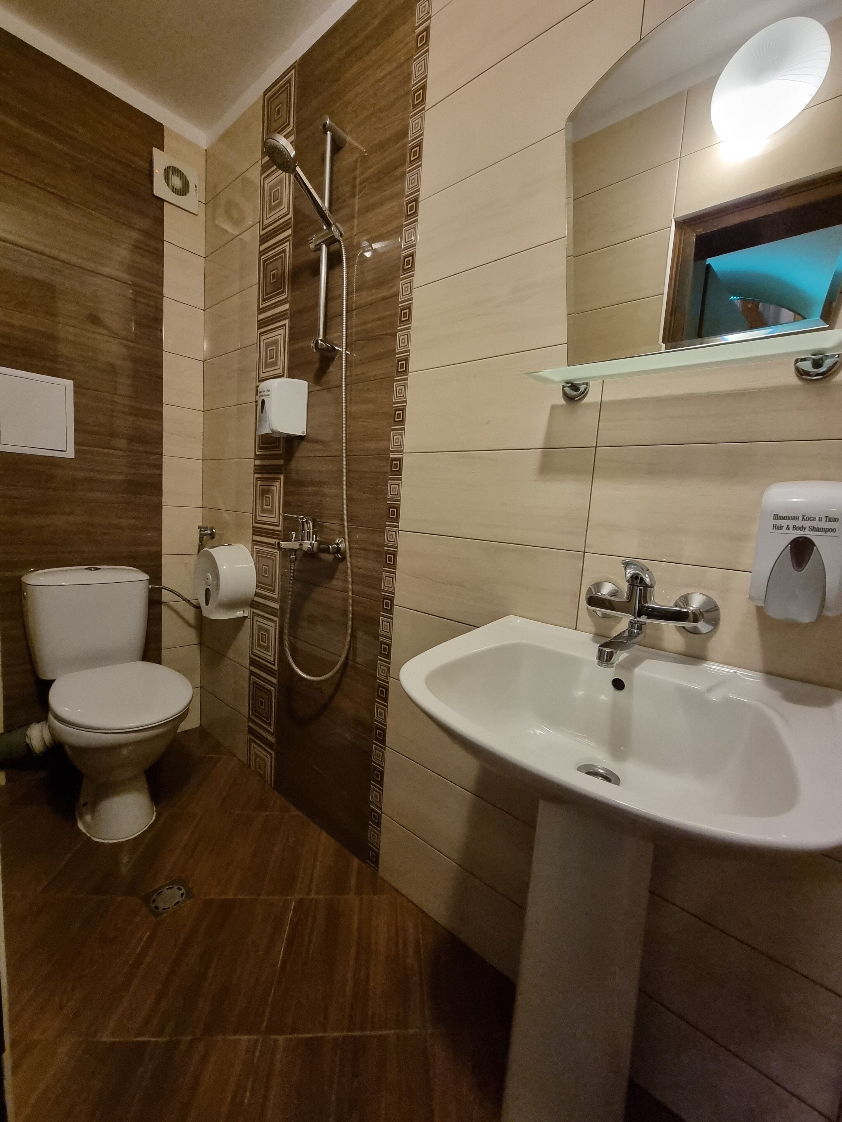 superior triple room, 1 queen bed with sofa bed, garden view | bathroom | free toiletries, hair dryer, bathrobes, slippers