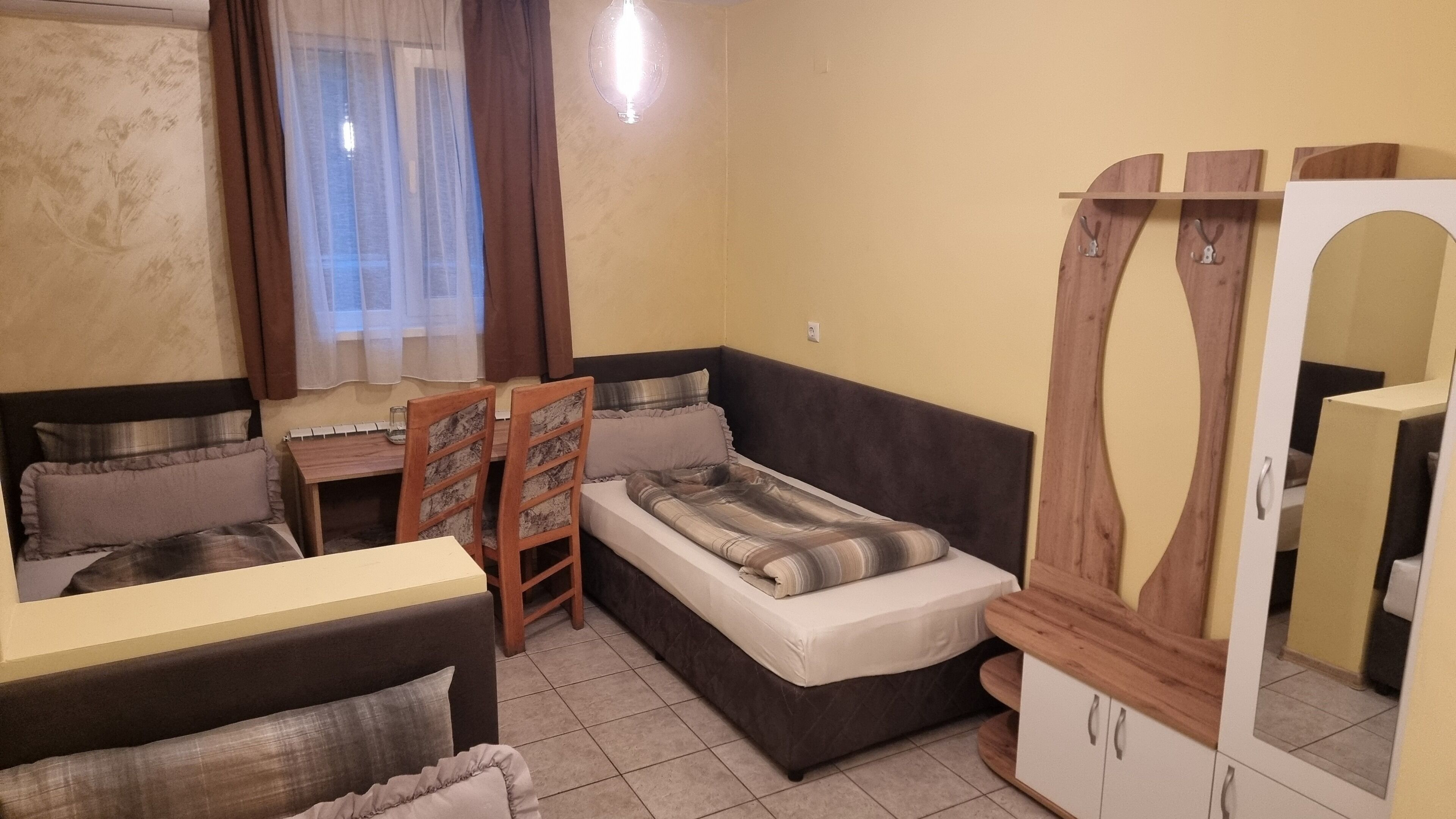 economy triple room | 1 bedroom, blackout curtains, iron/ironing board, free wifi