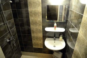 Shower, free toiletries, hair dryer, bathrobes