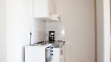Apartment, 1 Bedroom, Sea View | Private kitchenette | Fridge, stovetop, coffee/tea maker, electric kettle