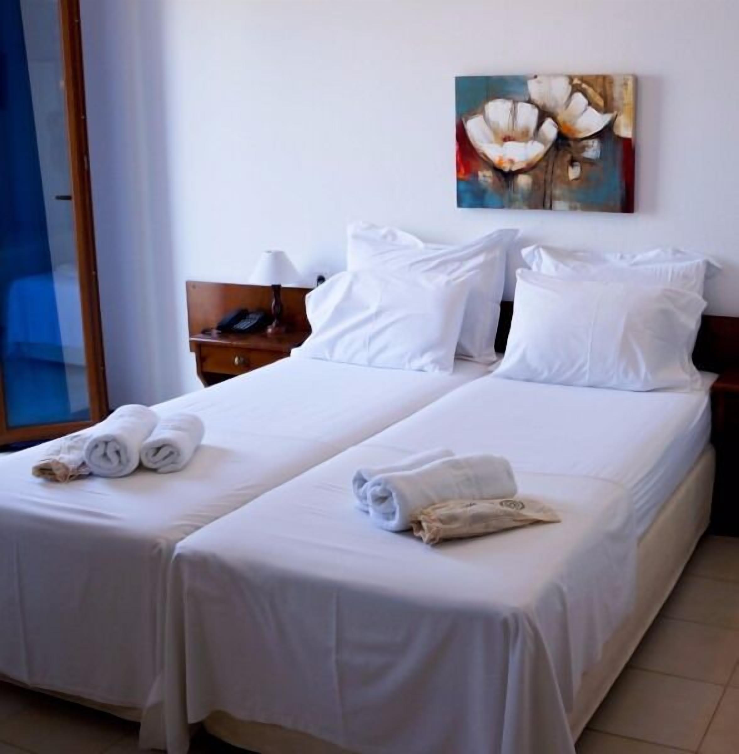 double room, pool view | in-room safe, soundproofing, iron/ironing board, free wifi