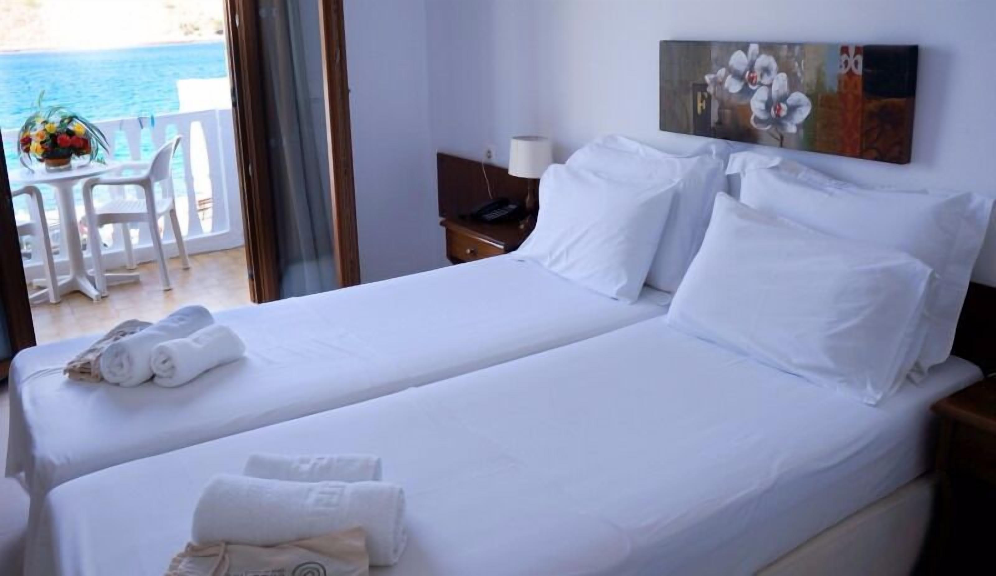 double room, pool view | in-room safe, soundproofing, iron/ironing board, free wifi