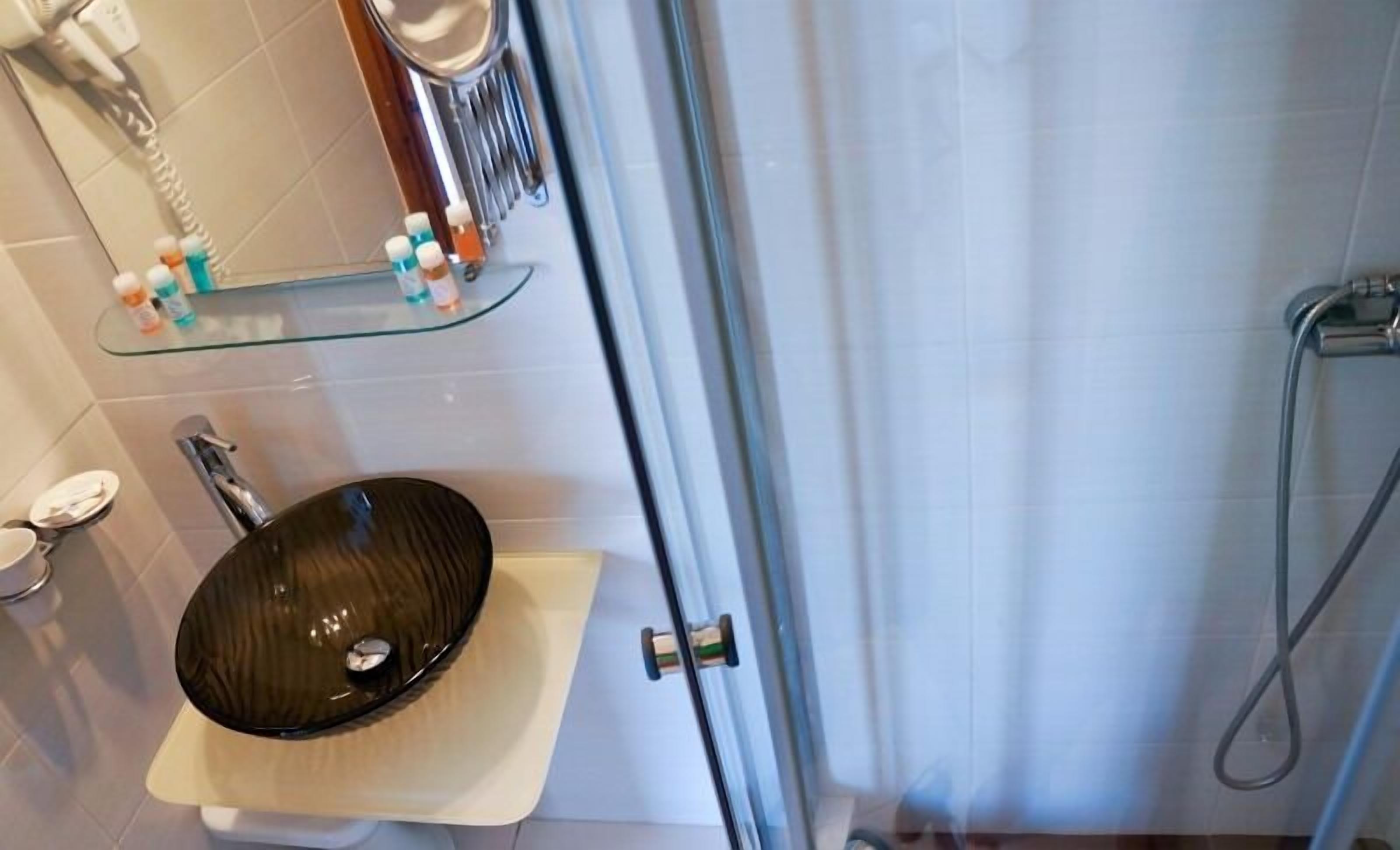 double room, pool view | bathroom | shower, free toiletries, hair dryer, towels