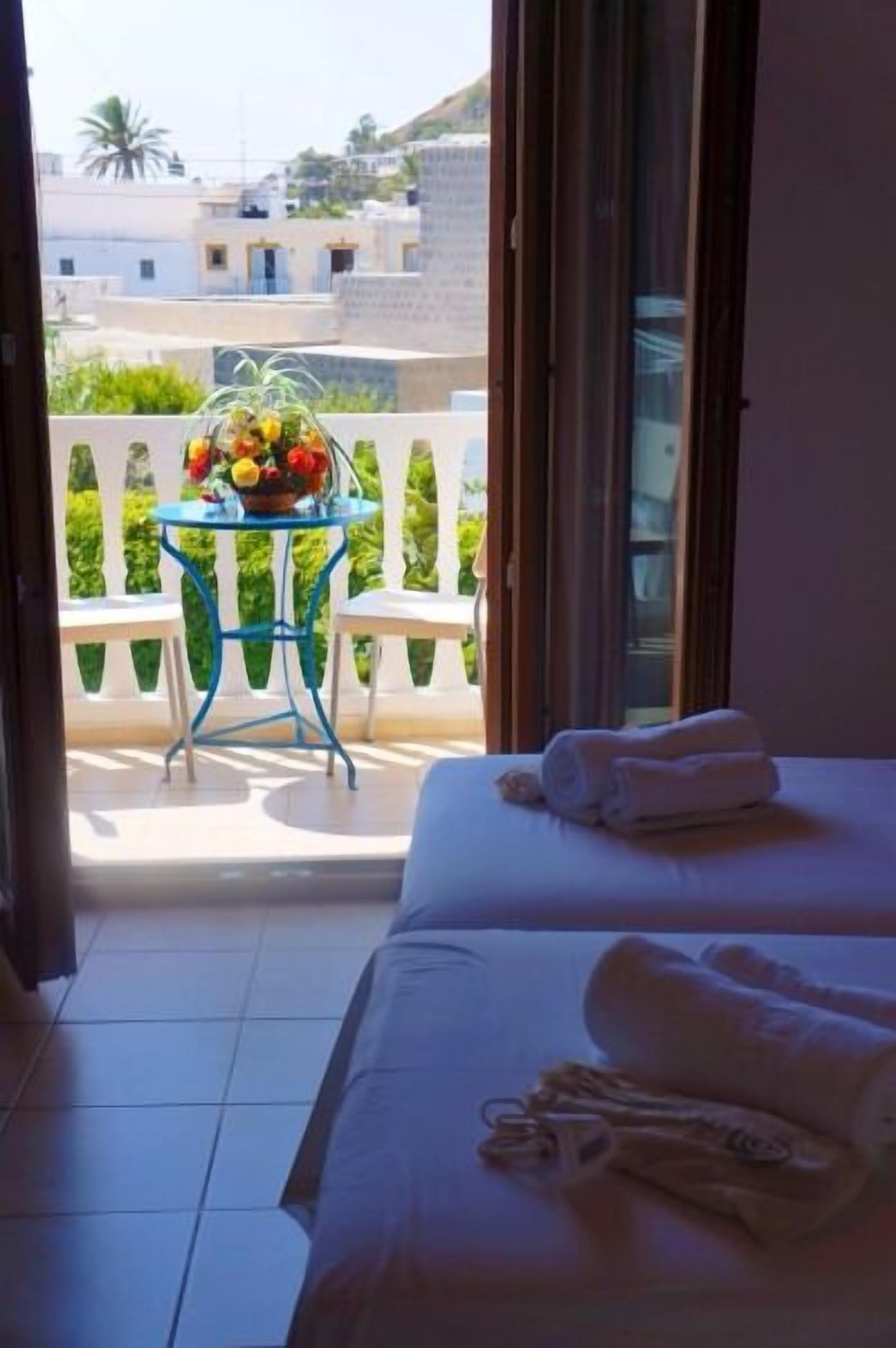 double room, pool view | in-room safe, soundproofing, iron/ironing board, free wifi