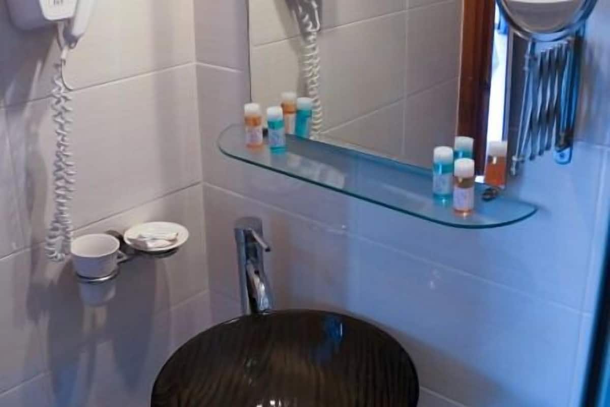 triple room, pool view (extra bed) | bathroom | shower, free toiletries, hair dryer, towels