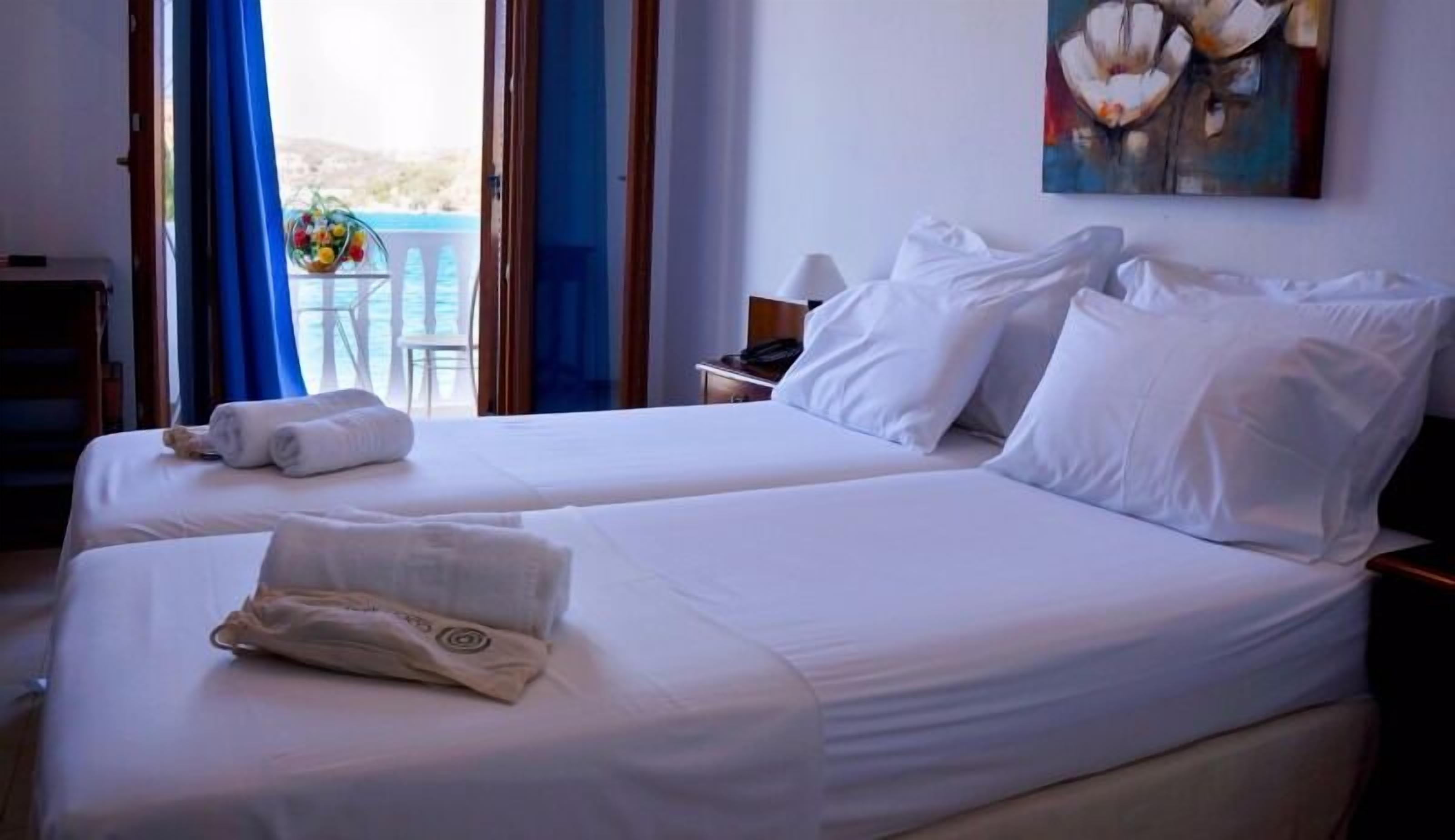 double room, pool view | in-room safe, soundproofing, iron/ironing board, free wifi