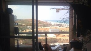 Superior Apartment, 1 Bedroom | Living room | 42-inch LCD TV with cable channels, TV - Cozy Sea View Apartment (Bat Yam)