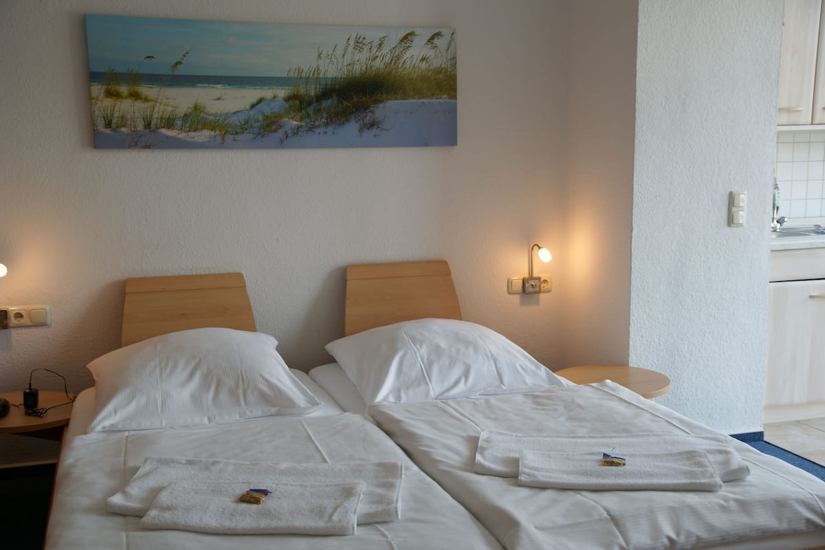 Studio | Een strijkplank/strijkijzer, babybedden, gratis wifi