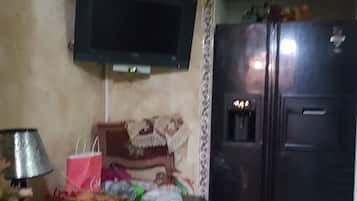 Apartamento, 2 quartos | Cozinha privada | Geladeira grande, micro-ondas, fogão