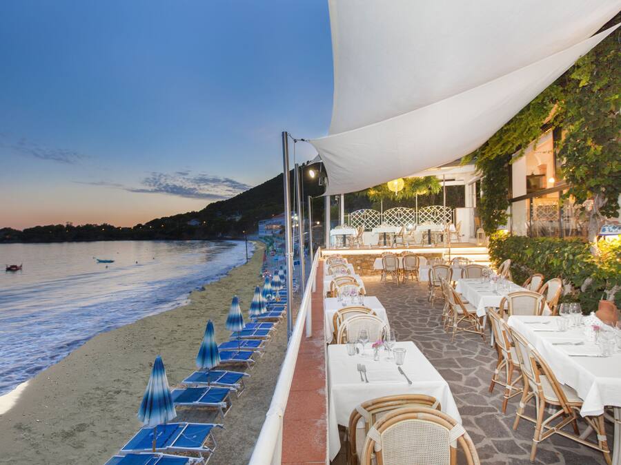 Breakfast, lunch, dinner served; local cuisine, beach views