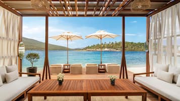 Private beach, white sand, beach cabanas, sun loungers